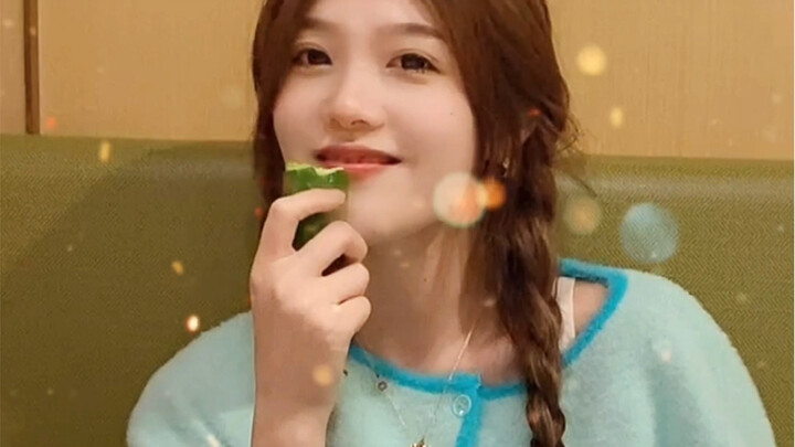 Can I get a bite of that cucumber in this cutie’s hand?