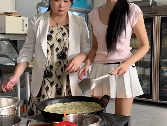 Mom has sound values and teaches her daughter how to make pancakes.