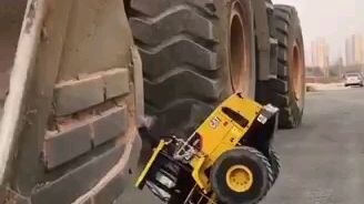 payloader vs.small leader