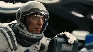 Astronauts Attempt To Ensure Survival Through A Wormhole In Space With Strangers' Aid.  INTERSTELLAR