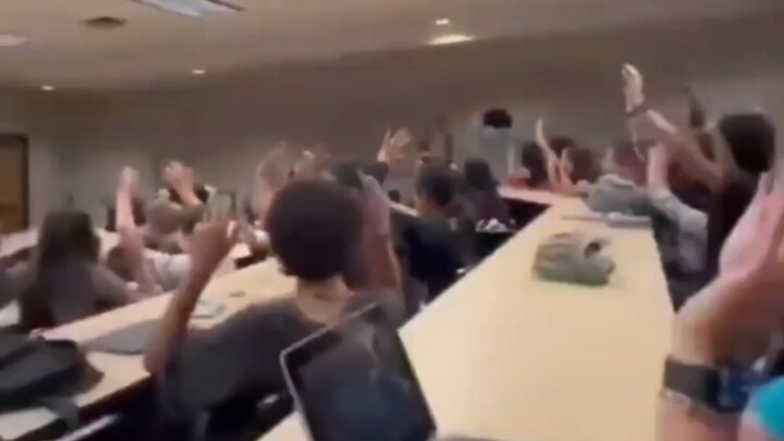 American students sure do love learning, all raising their hands to rush to answer FBL’s questions!