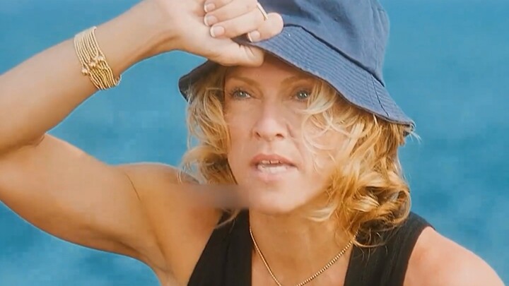 “Love on a Desert Island” – A wealthy woman and the male waiter she despises most are stranded on a 
