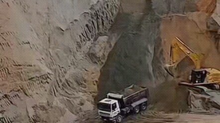 The excavator operator is highly skilled and fearless.