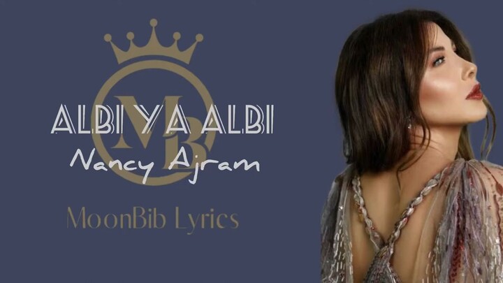 Nancy Ajram - Albi Ya Albi _ نانسي عجرم - قلبي ياقلبي ( Lagu Arab Lirik , Latin)