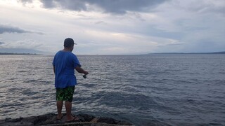 Casting at Bacacay Pier.