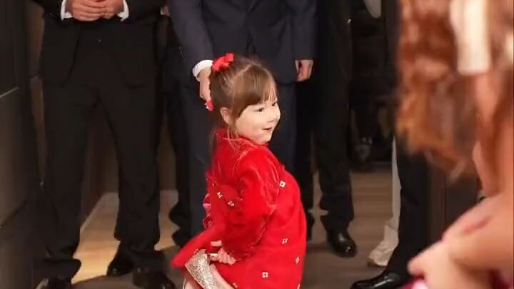 Cute kid blocks the door; children's innocence comes from their purity.