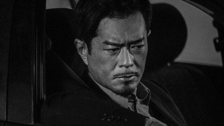 Louis Koo plays the most crazy drug lord Dizang. He scolds the three bosses and they become scared i