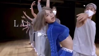 A collection of Lisa tossing her head and outfit changes in "LALISA"