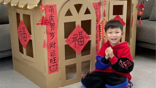 过年啦，爸爸用废纸箱给孩子做个春节小屋，喜气洋洋过大年