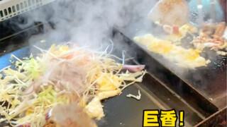 أرز مقلي مع الحبار على الصاج! بالفعل المحل القديم الذي يتجاوز عمره عشر سنوات ليس عاديًا!