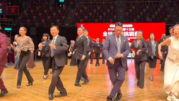 # Suit-dance craze has swept Hong Kong! Between rounds of the Global Dance King Competition, judges 