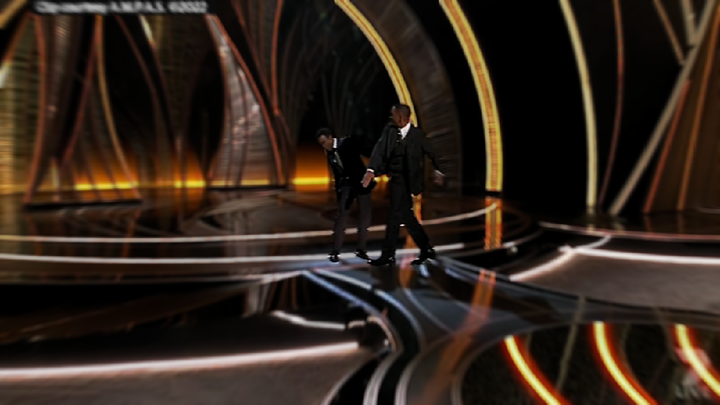 Watch the uncensored moment Will Smith smacks Chris Rock on stage at the Oscars,