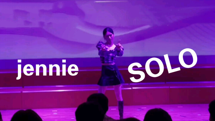 The girl dances Jennie's "Solo" dance at the graduation ceremony 