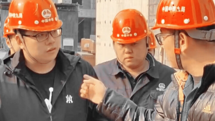 Step aside, the red-hatted inspector is conducting a routine check.