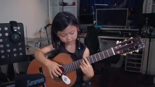 [Music]A little girl's guitar playing of <The Most Evolved>