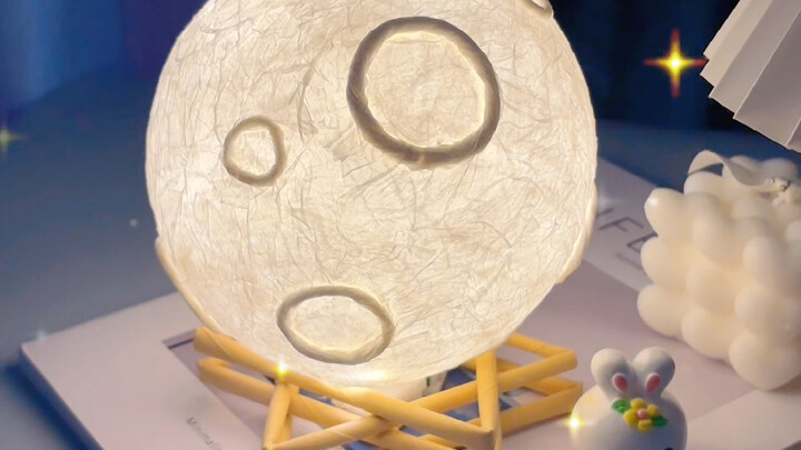 Make a simple yet beautiful moon lantern with tissues and white glue—this is all your kid needs for 