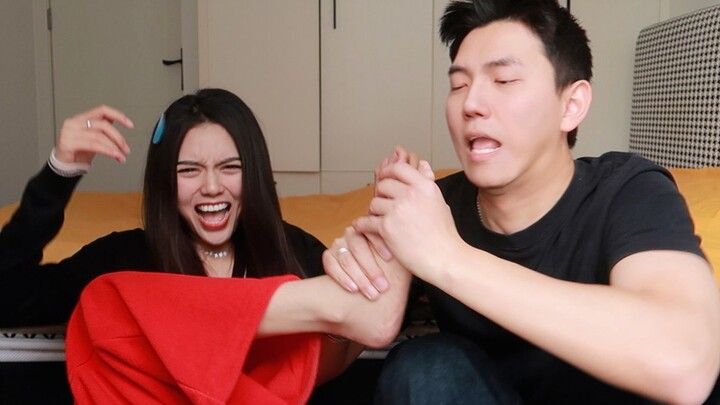 Couple Extreme Tug-of-War