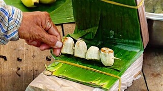 grilled banana with coconut sauce , guayjub at floating market