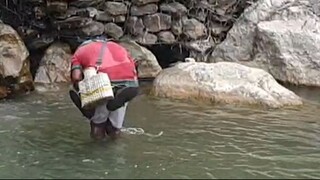 cast netting in Nepal | himalayan trout fishing technique