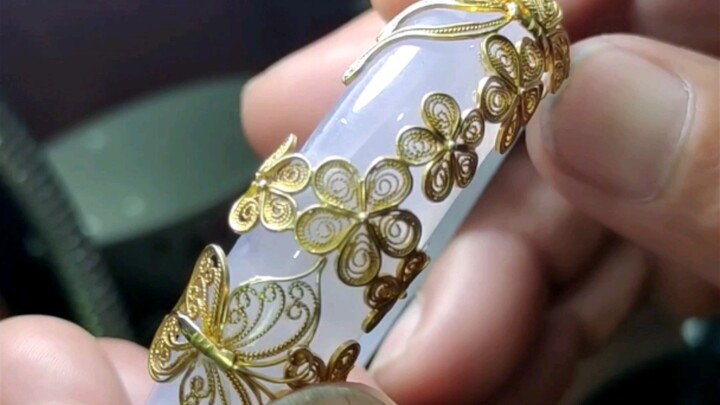It’s a bit of a shame to take apart such a beautiful gold-inlaid piece.
