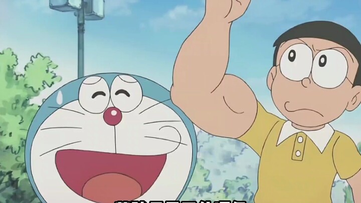 The blue fat man grew Nobita's head, and Nobita became a muscular man