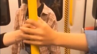 Back then, people riding the subway didn't have to wear masks.