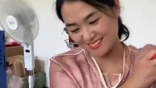 Gradually breaking into a smile, then the smile slowly fading away