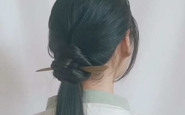 In winter, a low ponytail still keeps you warmer; protecting the nape of your neck is key.