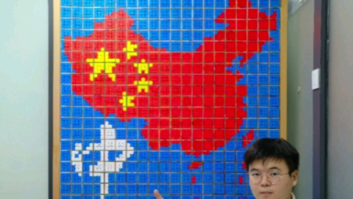 8 Rubik’s Cube enthusiasts used 560 cubes and 5 hours to piece together a map of China! Happy Nation