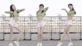 A girl dances with "thumbs up" in graceful clothes