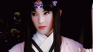 [It's hard to tell whether he is male or female] This guy looks great in women's clothing, but he lo