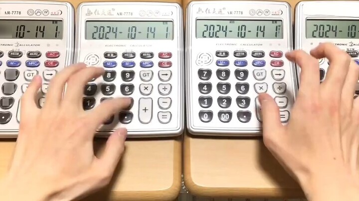 Playing "Doraemon's Dream Come True" with four calculators