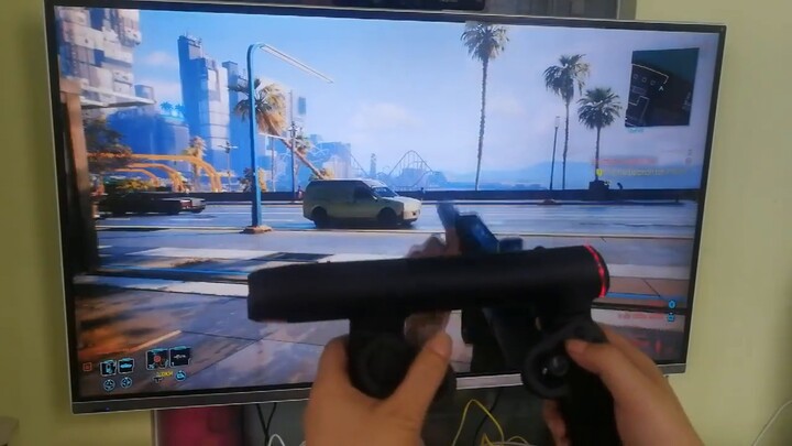 Mainkan Cyberpunk 2077 dengan pengontrol permainan tipe senjata yang baru dikembangkan, bidik laser,