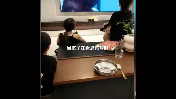 The kid was watching a horror movie at home, and when Dad got back, the prank began.