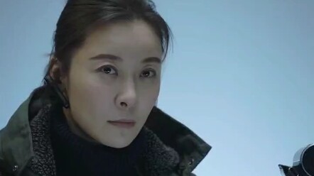 The Killer: Who could resist a female cop like this?