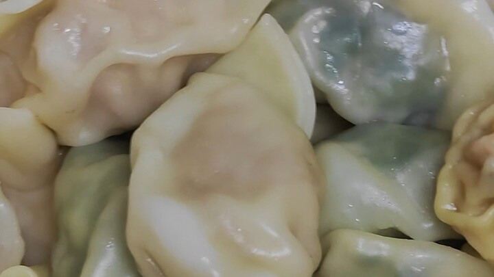 Dumplings dipped in ketchup—so delicious!