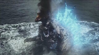 Kepala Godzilla hancur berkeping-keping! Hanya rahangnya yang tersisa, dan asap hitam mengepul dari 
