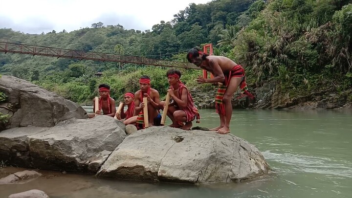 Playing bamboo instrument in Kalinga (rehearsing)