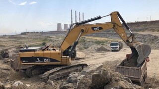 Caterpillar 385C Excavator Loads Blasts Materials On Trucks - Sotiriadis_Labrian