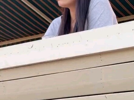 She smiles brightly in the sunshine