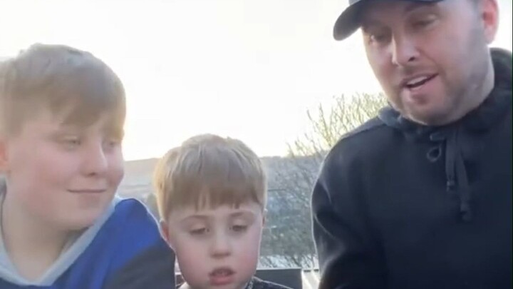 Dad takes his kid to try canned herring. After all the fussing and fumbling, he ends up spilling mor