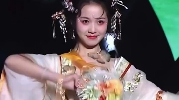 Orchard silver blossoms shine with dazzling splendor, as if bringing the celestial realm down to ear