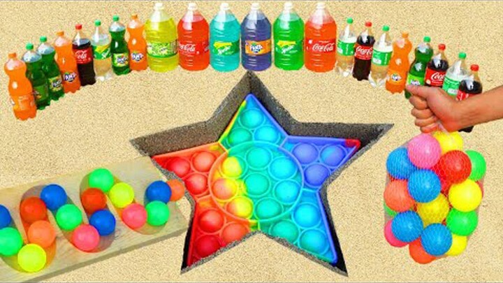 Tạo thành một ngôi sao trên bãi biển với Coke và Sprite Skittles