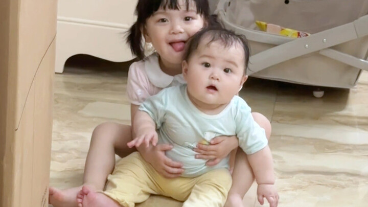 As soon as you open the door and walk back home, two little cuties greet you!