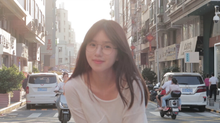 In my photo album, my forever-smiling girlfriend