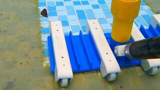 Comfortable video: Cleaning the bottom of a swimming pool with professional tools, plus a first-pers