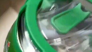 A young lady grabbed a 5-liter bucket of beer while trying to grab food. She was very distressed, an