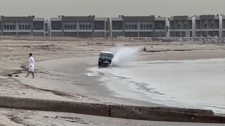 Arabic guys enjoy on beach...