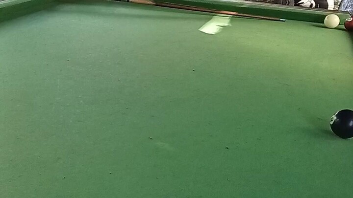 4 years old playing billiard