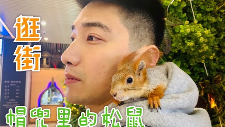 Heyco, the squirrel on his shoulder, is the coolest guy on the street